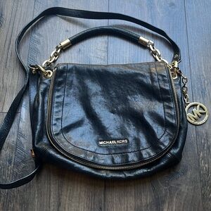 Michael Kors black leather shoulder purse lightly used.